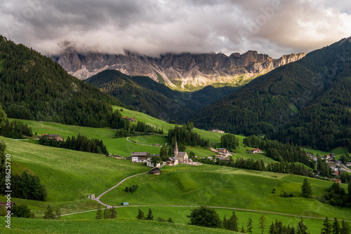 panoramic view of the dolomites in val di funes  the Odle with the village of Santa Maddalena below  Italy