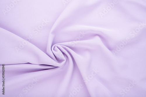 The Light purple satin fabric texture as background. Elegant background for design.
