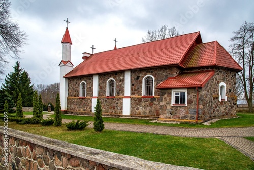 General view and architectural details of the Roman Catholic Church of Our Lady of Consolation built in 1948 in Jatwiez Duga in Podlasie, Poland.