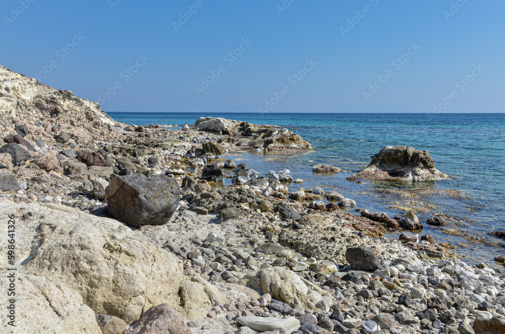 rocks ad reefs at low tide on Alacati coast near Gilikli Beach (Cesme, Izmir province, Turkey)	
