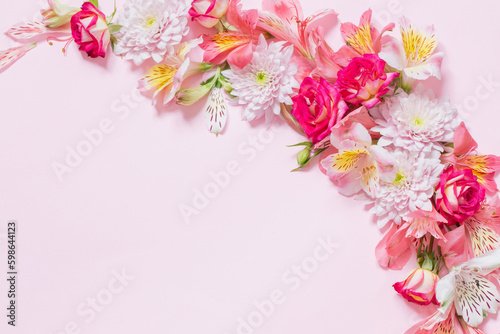 alstroemeriaand chrysanthemums  flowers on pink background © Maya Kruchancova