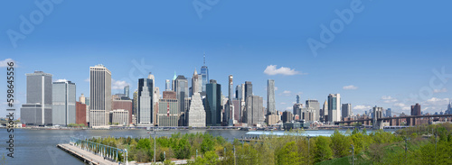 brooklyn bridge park pier 3 plaza and panorama of Manhattan and brooklyn bridge across the East River from Brooklyn © Alevtina