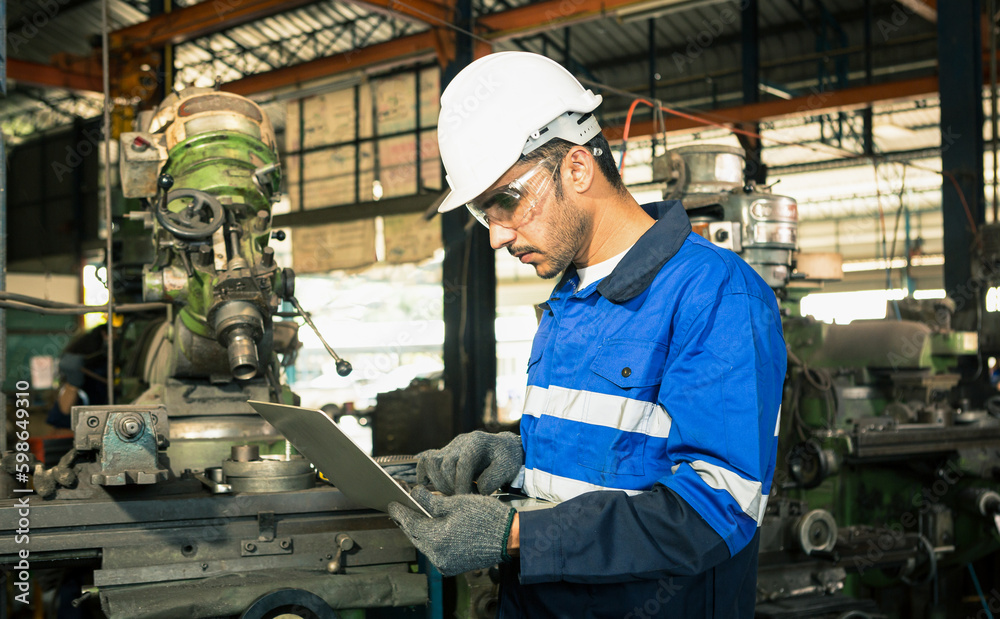 Portrait of worker, technician, professional engineer, helmet, using laptop, with control in production line. Portrait of worker, technician, professional engineer, helmet, using laptop, with control in production line.