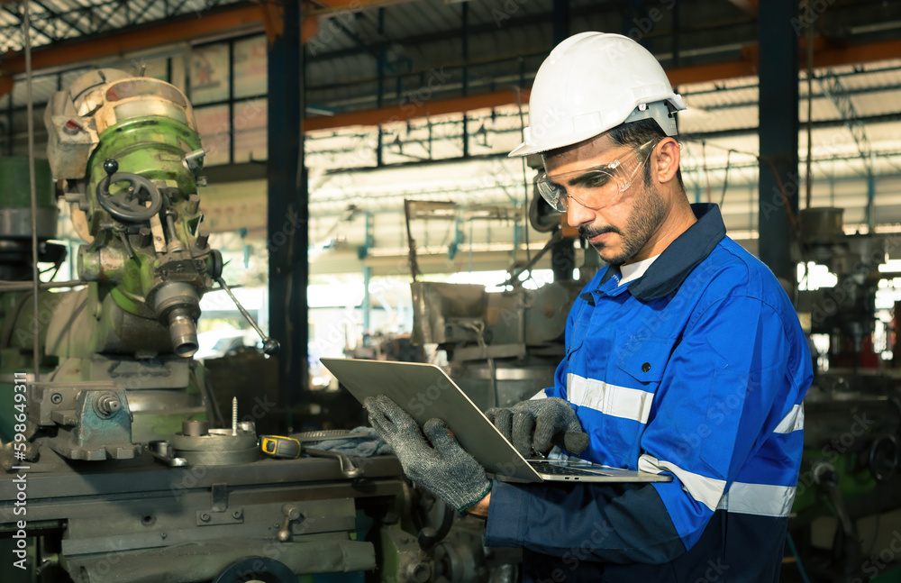 Portrait of worker, technician, professional engineer, helmet, using laptop, with control in production line. Portrait of worker, technician, professional engineer, helmet, using laptop, with control in production line.