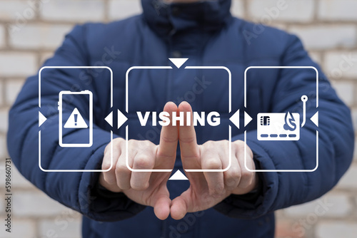 Man using virtual touchscreen presses text: VISHING. Concept of vishing. Voice phishing electronic fraud. Vishing call warning and alert. Smart phone cybersecurity. photo