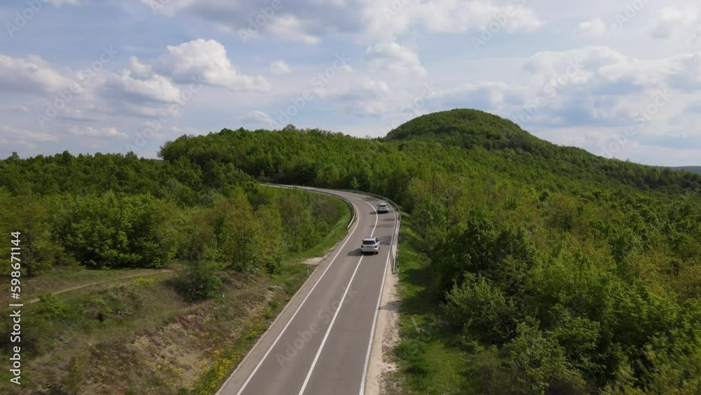 car drive on asphalt road in mountain range in spring travel concept car drive on asphalt road in mountain range in spring travel concept