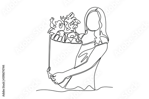 Continuous one line drawing happy woman carrying vegetable groceries bag. Business activity concept in market. Single line draw design vector graphic illustration.