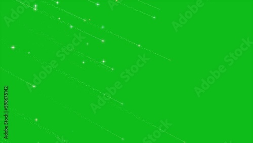 Blinking Glowing Shooting Stars Falling From The Sky, Blinking Stars Falling On Green Screen BG. Shooting Stars Falling On Green Screen Background. 	 photo