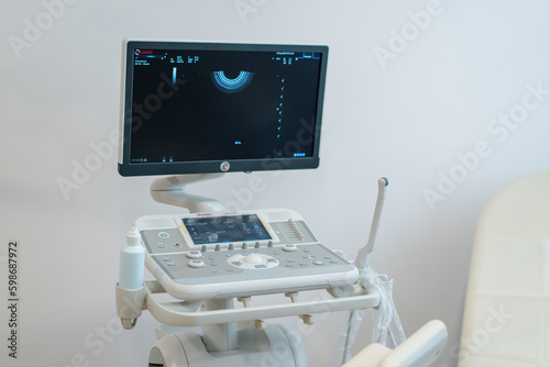 Medical office with ultrasound diagnostic equipment in the health clinic gynecological office