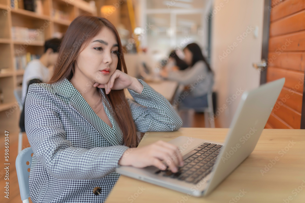 Portrait of businesswoman in the office,Mature manager working in the company Portrait of businesswoman in the office,Mature manager working in the company