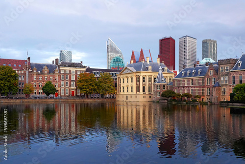 The historic Mauritshuis art museum and Binnenhof government buildings with modern skyscrapers in the background in the Hague, Netherlands. 