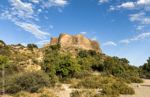 View of Sagunto Castle. Ruins walls of the Fortress Castle at the town of Sagunto, near Valencia in Spain. Fortress Castillo in Mountains hills. Fort on mountain.