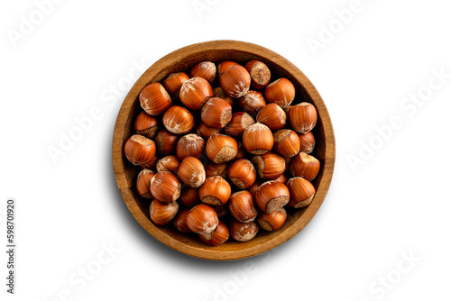 In shell hazelnuts bowl. Up view studio shoot isolated on white background.