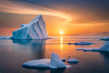 A majestic iceberg floating in an icy sea, with the sun setting behind it, casting the sky in a warm orange hue