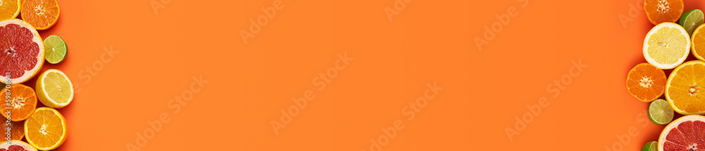 Fresh, Fruity and juicy fruit concept with free text space, web banner. Flat layout with various fresh cut citrus fruits on the left and right side of the picture on an orange background Fresh, Fruity and juicy fruit concept with free text space, web banner. Flat layout with various fresh cut citrus fruits on the left and right side of the picture on an orange background