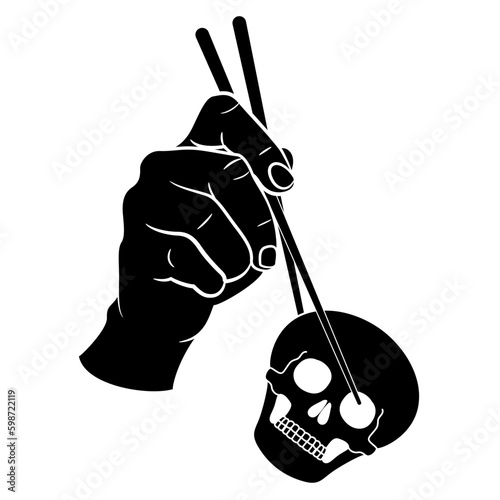 Human hand holding skull with chopsticks. Devour death. Creative concept. Black and white negative silhouette.