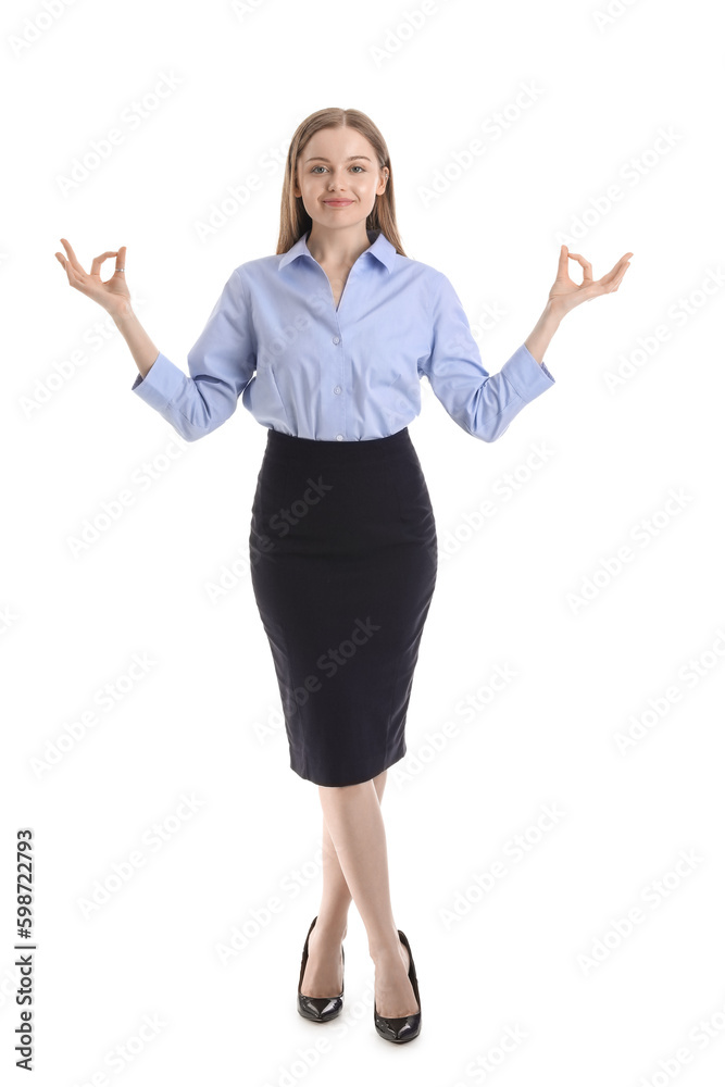 Young businesswoman meditating on white background. Balance concept Young businesswoman meditating on white background. Balance concept