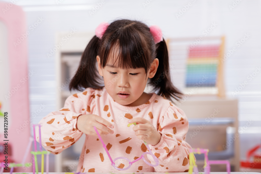 young girl was playing creative toys at home young girl was playing creative toys at home