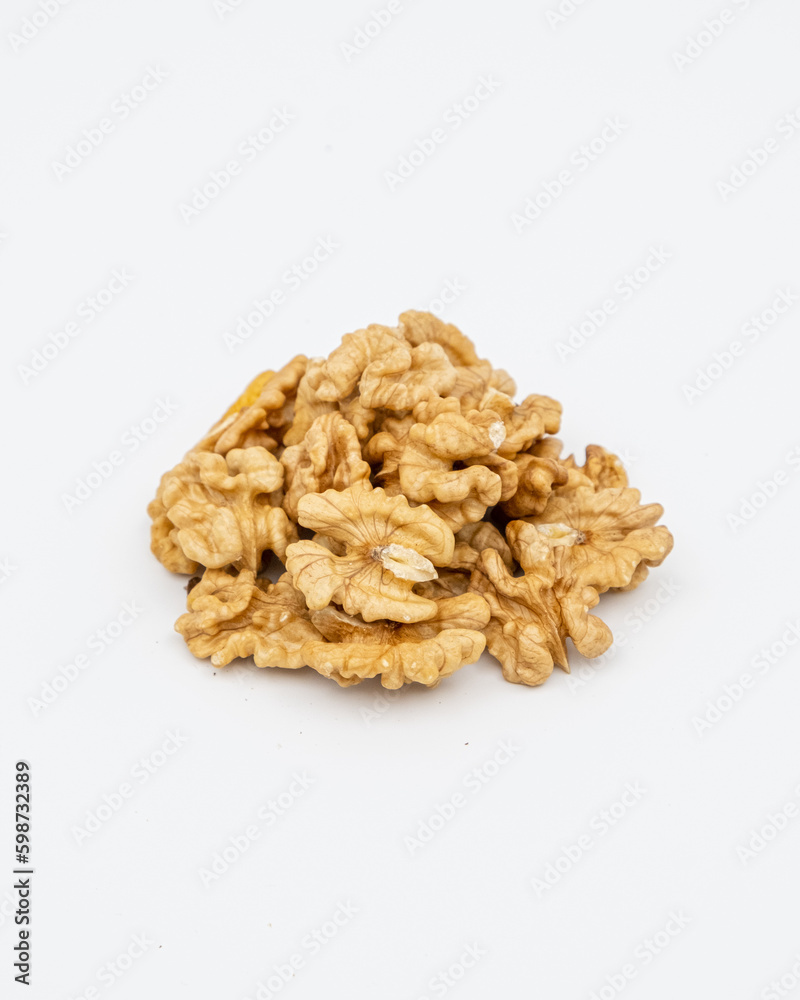 peeled walnut isolated on white background