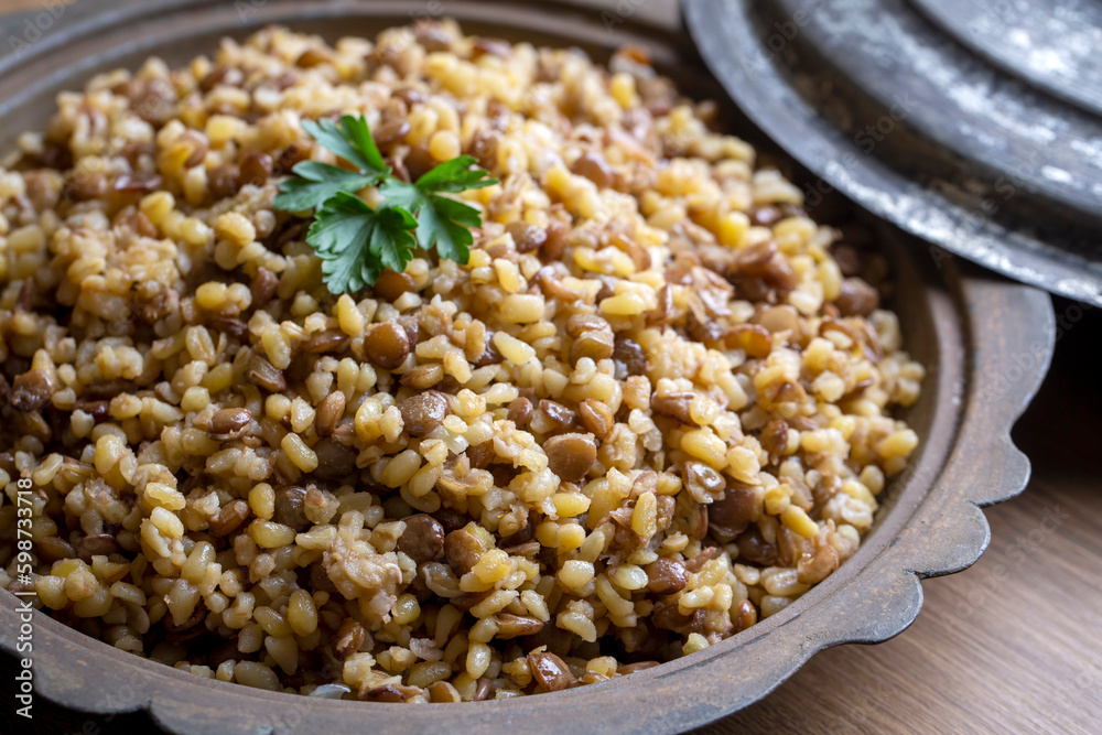Traditional delicious Turkish foods; bulgur pilaf with green lentils (Turkish name; yesil mercimekli bulgur pilavi) Traditional delicious Turkish foods; bulgur pilaf with green lentils (Turkish name; yesil mercimekli bulgur pilavi)