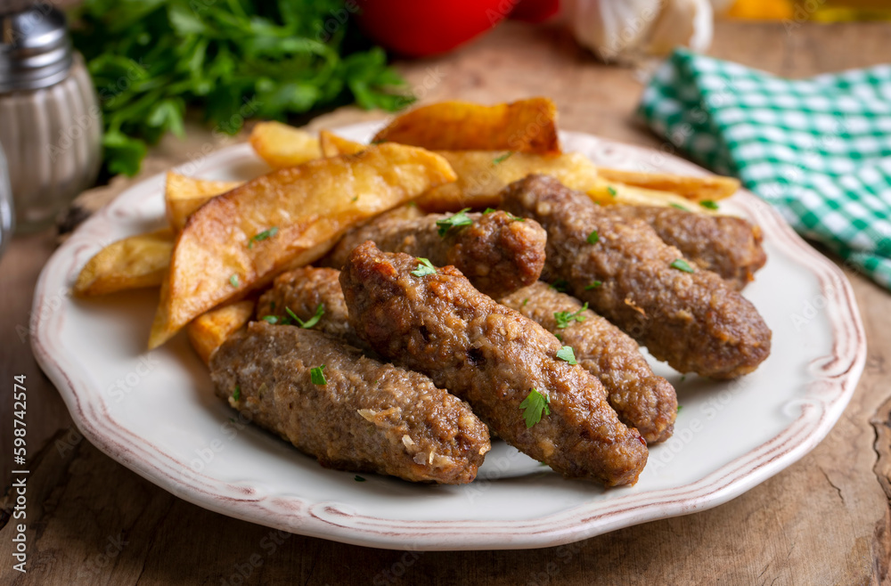 Traditional Turkish food; dry meatballs or inegöl meatballs with potatoes (Turkish name; Kuru kofte or anne koftesi) Traditional Turkish food; dry meatballs or inegöl meatballs with potatoes (Turkish name; Kuru kofte or anne koftesi)