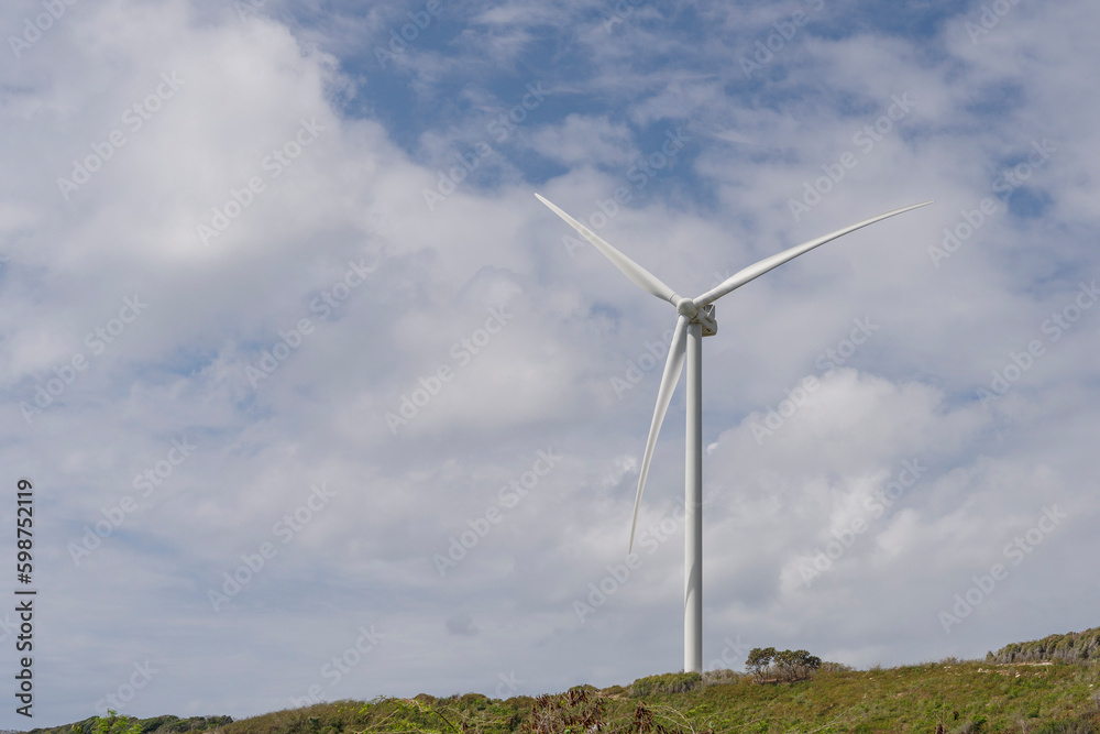 Wind farm with tall wind turbines to generate electricity. Wind farm with tall wind turbines to generate electricity.