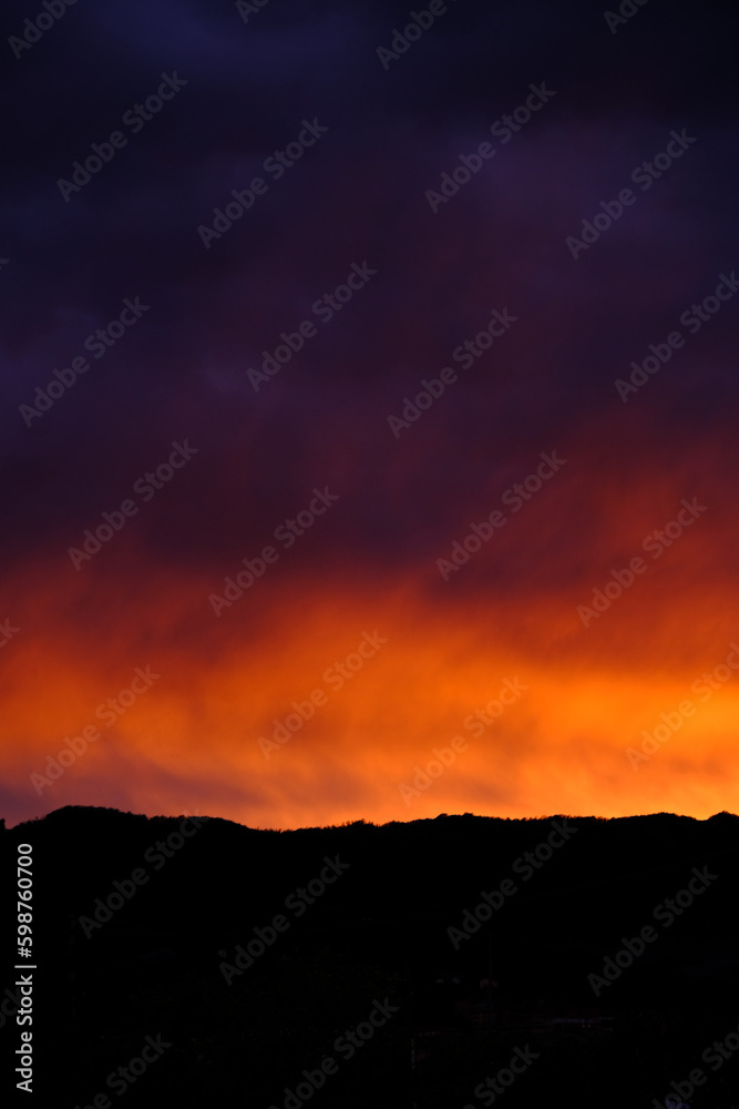 fiery red sunset texture during a summer evening in western Liguria in 2023 fiery red sunset texture during a summer evening in western Liguria in 2023