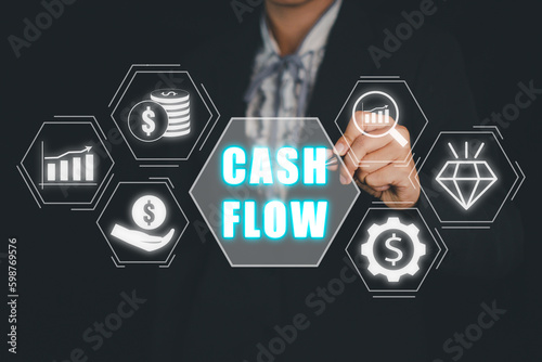 Cash flow concept, Business person hand select cash flow icon on virtual screen.