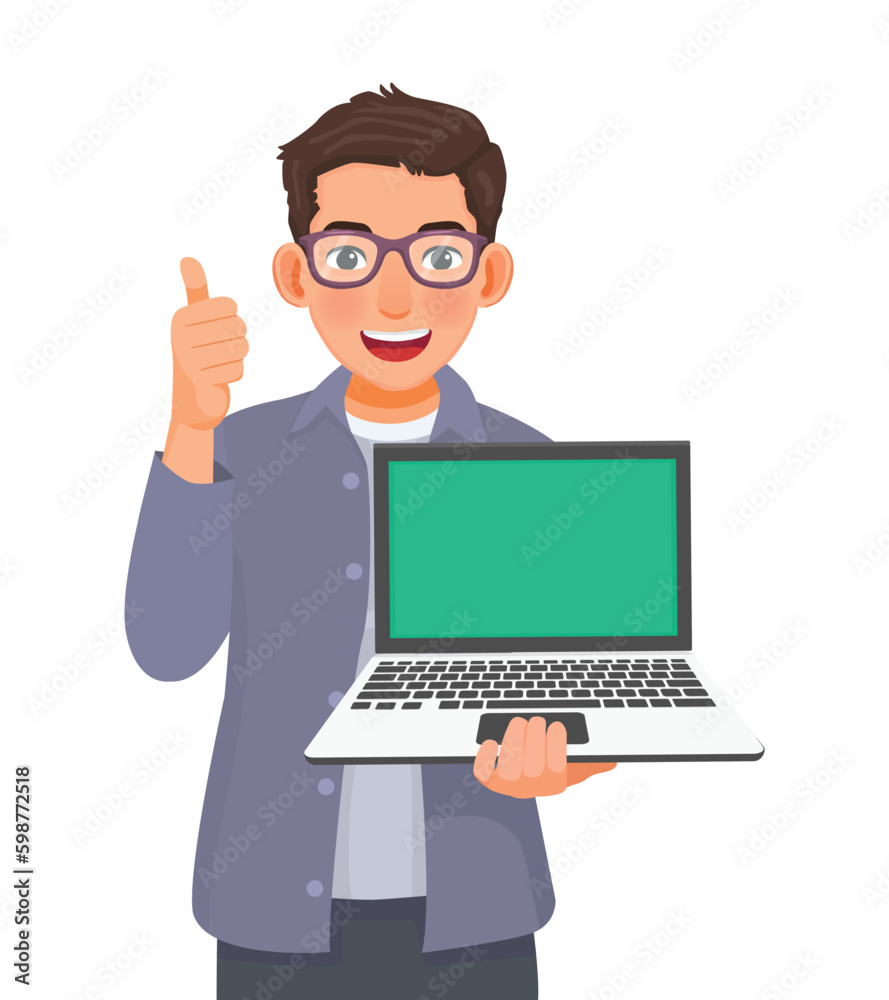 Young businessman with glasses holding laptop with blank screen for copy space showing thumb up Young businessman with glasses holding laptop with blank screen for copy space showing thumb up
