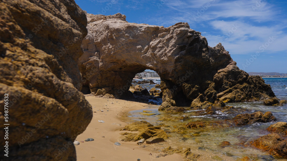 Rock arch on beach in Los Cabos, Mexico