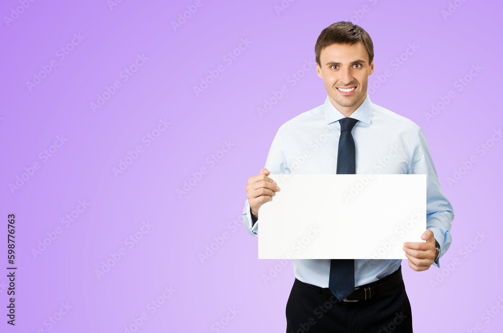 Image of business man professional bank manager in confident cloth, wear shirt, necktie tie. Standing businessman hold, show empty white banner sign board. Isolated light purple violet background Image of business man professional bank manager in confident cloth, wear shirt, necktie tie. Standing businessman hold, show empty white banner sign board. Isolated light purple violet background