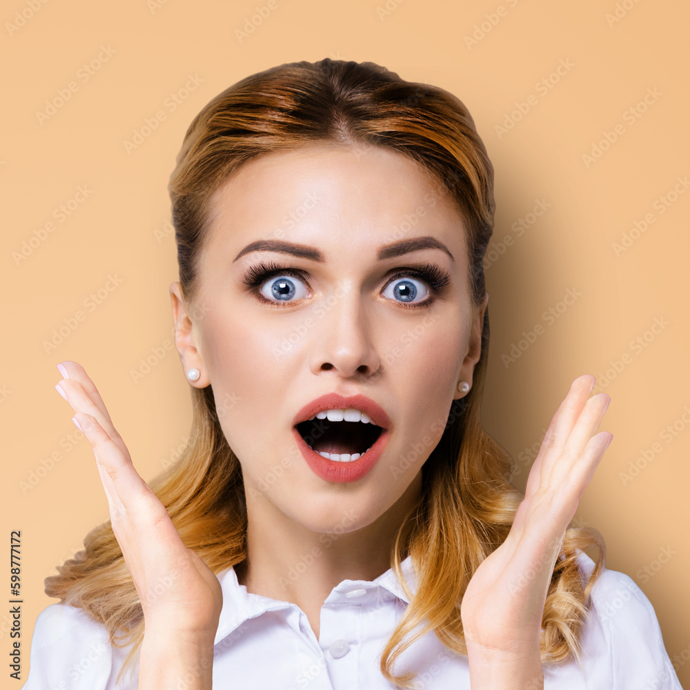 Wow. Face portrait excited surprised, shocked happy woman with wide open mouth and eyes, raised up hands, isolated beige background. Unbelievable sales offers, ad concept. Square. Wow. Face portrait excited surprised, shocked happy woman with wide open mouth and eyes, raised up hands, isolated beige background. Unbelievable sales offers, ad concept. Square.