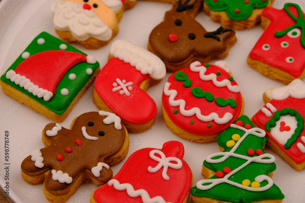 tasty Christmas cookies on a white ceramic plate. delicious colorful Christmas cookies. kue kering natal.