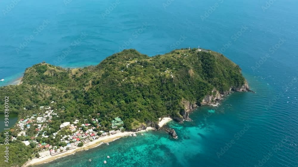 Volcanic island Apo in a marine reserve. Negros, Philippines. Popular dive site and snorkeling destination with tourists. Generative AI Volcanic island Apo in a marine reserve. Negros, Philippines. Popular dive site and snorkeling destination with tourists. Generative AI