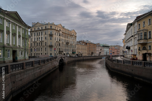 Moika River Embankment and the 2nd Winter Bridge on a cloudy spring morning, Saint Petersburg, Russia