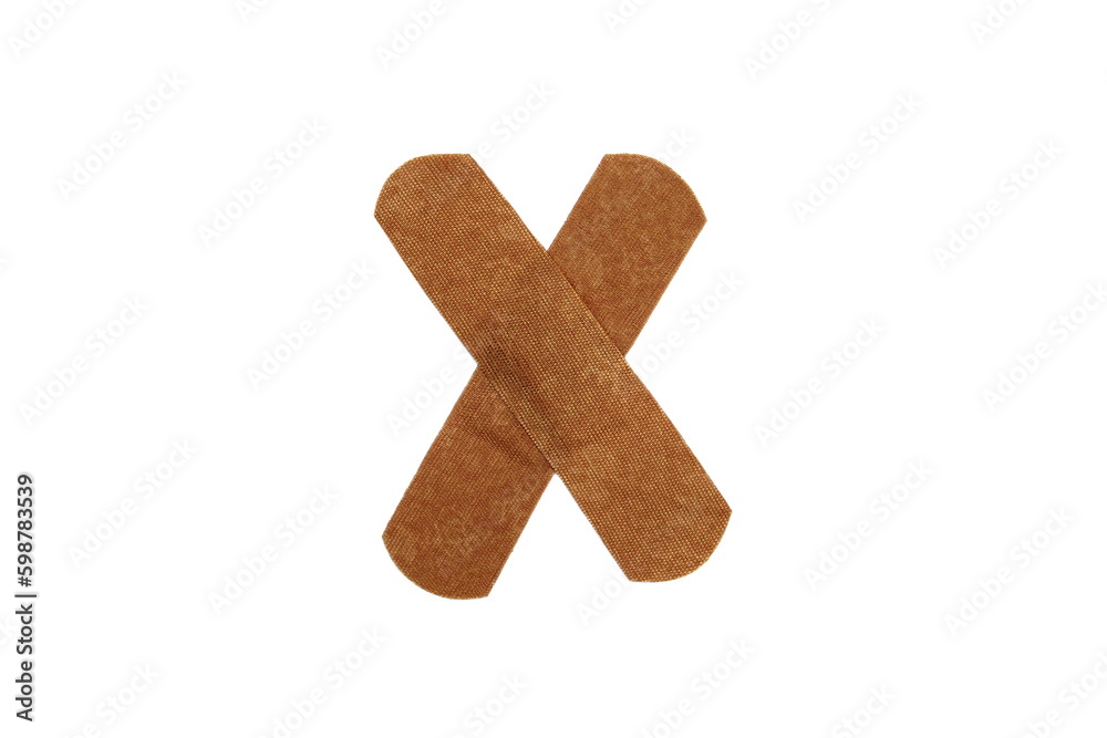 On a white isolated background there is an adhesive plaster in the form of a cross. On a white isolated background there is an adhesive plaster in the form of a cross.