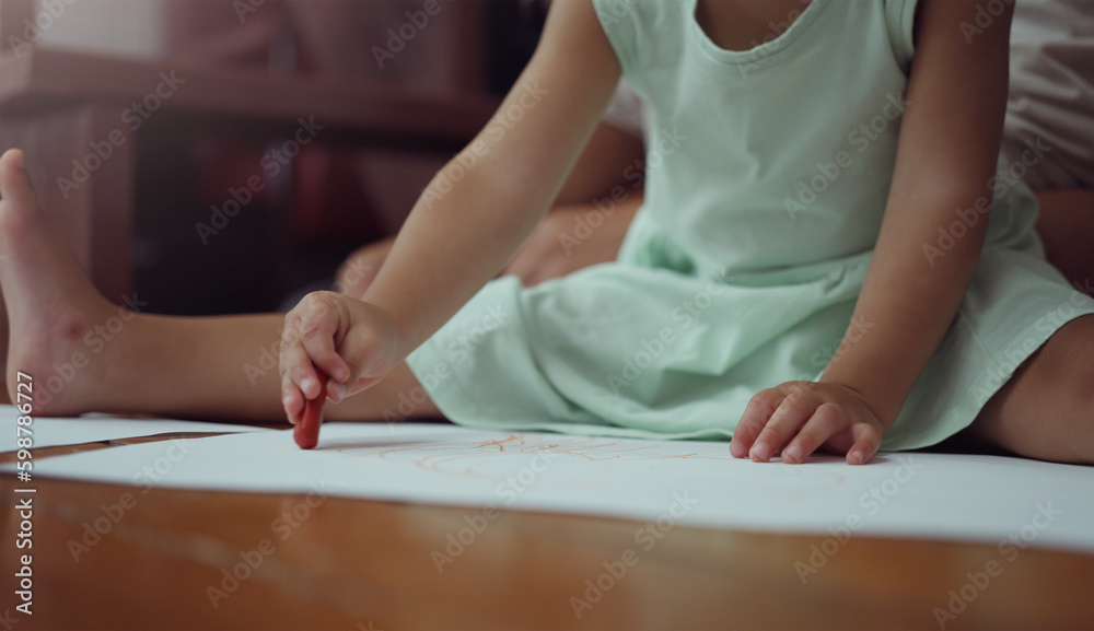 Girl kid drawing with crayons. Girl kid drawing with crayons.