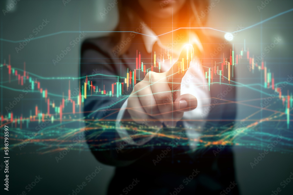 Finger of businesswomen touch graph screen,financial analysis and statistics, trade stock market hologram ,bar chart  for Business girl concept