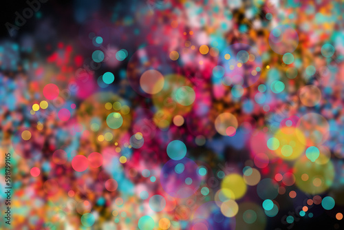 abstract colorful bokeh background. defocused lights on black background