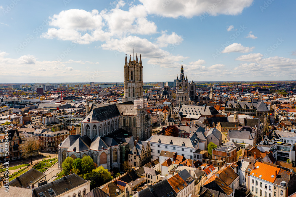 View of St Nicholas' Church in Ghent and Saint Bavo Cathedral, Belgium travel and landmarks from above.