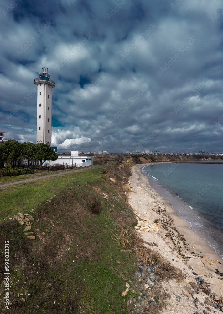 Fototapeta premium Aerial view to a lighthouse on the coast