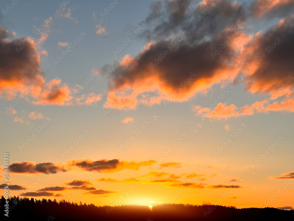 Sunset sky The sunrise is decorated with clouds in various shapes Sunset sky The sunrise is decorated with clouds in various shapes