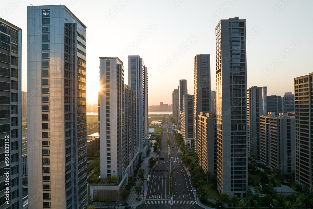 Obraz premium modern building with sunset