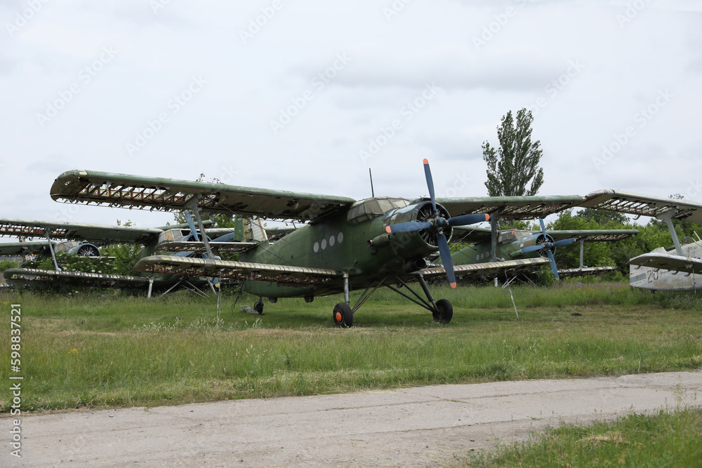 abandoned damaged soviet union military airplane Antonov An-2