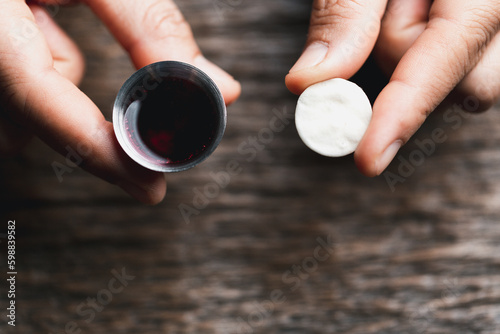 Concept of Eucharist or holy communion of Christianity. Eucharist is sacrament instituted by Jesus. during last supper with disciples. Bread and wine is body and blood of Jesus Christ of Christians.