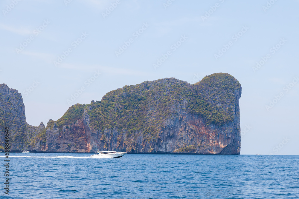 island in thailanisland and boat in thailand andaman sea. travel during vacation to the hot countries of asia.d andaman sea. travel during vacation to the hot countries of asia.