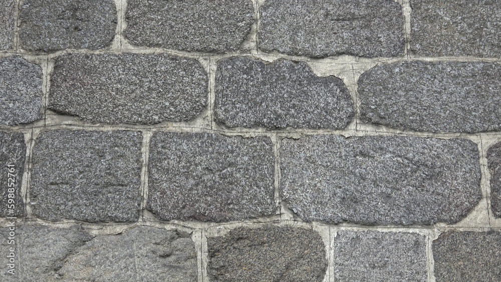 Detail of a stone wall with different size of rocks. Detail of a stone wall with different size of rocks.