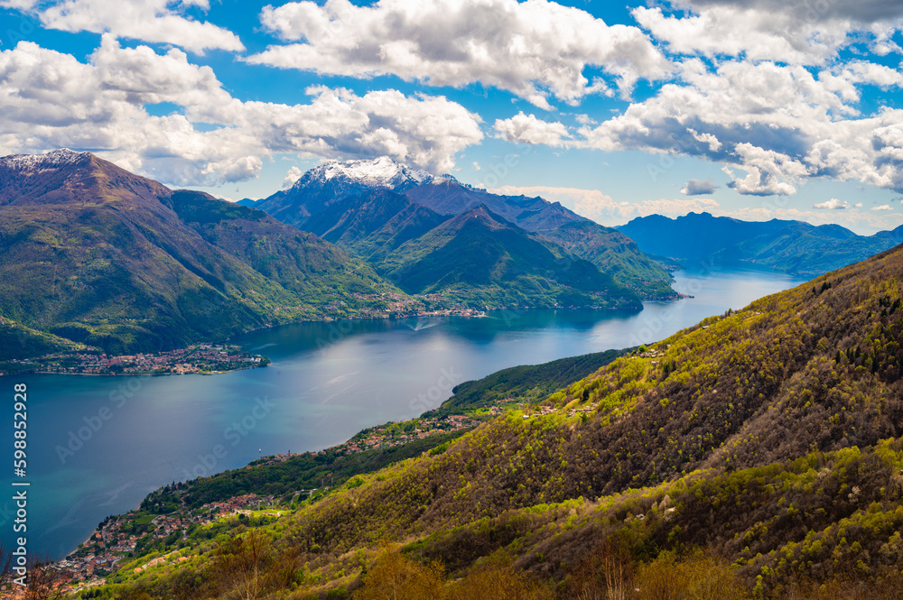 View of Lake Como, towards the south, from the church of San Bernardo in Musso, with the mountains above, Dervio, the streets and the villages bordering the lake.
View of Lake Como, towards the south, from the church of San Bernardo in Musso, with the mountains above, Dervio, the streets and the villages bordering the lake.