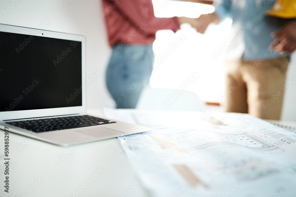 Renovations on its way. two unrecognizable businesspeople shaking hands in agreement over building plans in the office. Renovations on its way. two unrecognizable businesspeople shaking hands in agreement over building plans in the office.