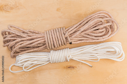 Obraz na plátně Accessory cord and climbing rope bights with Alpine coil knots